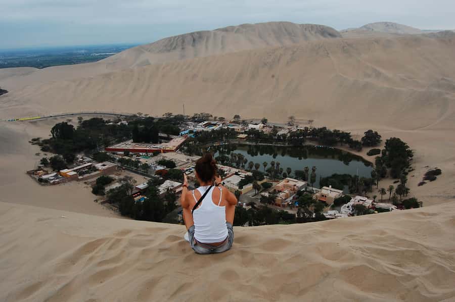 Ballestas Islands and Huacachina Oasis Half-Day Tour - Up to Three Islands and Caves: How Ballestas Wildlife Actually Shows Up