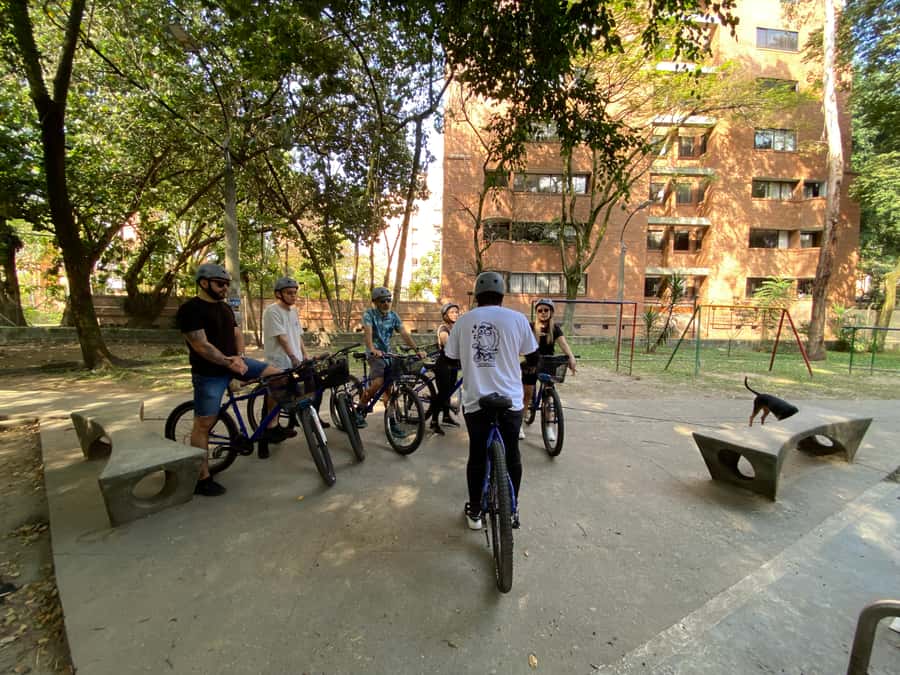 Bike Tour Medellin with Snacks and Local Beer - Conquistadores pass-by: quick context in the flow