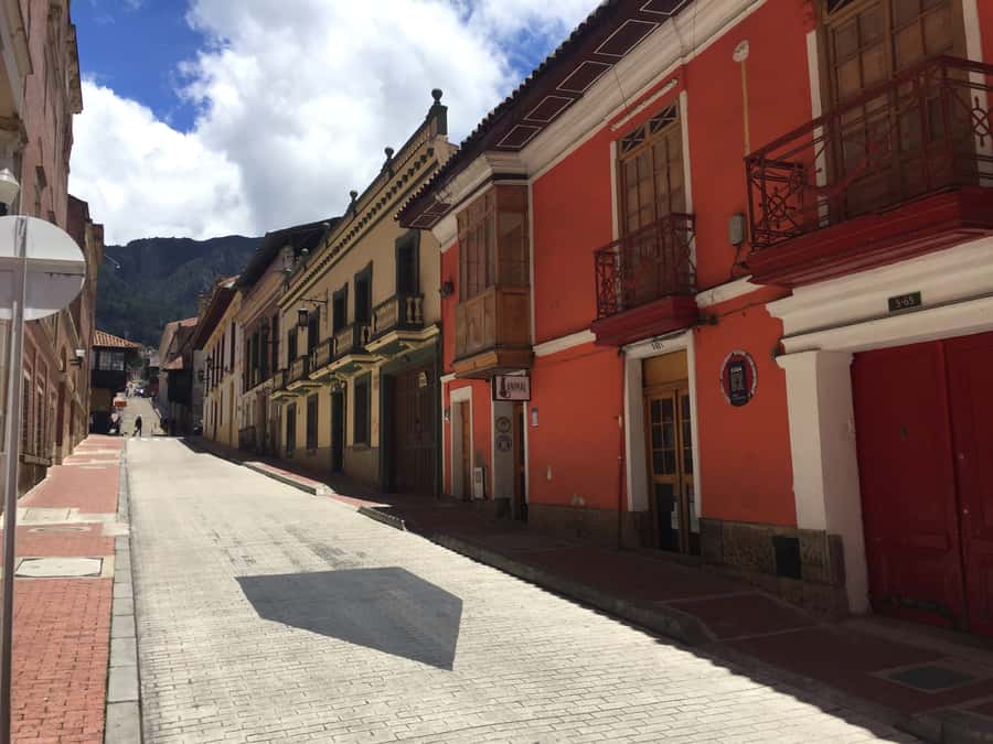 Bogota: La Candelaria Highlights Walking Tour - Chorro de Quevedo: old streets with real emotional weight