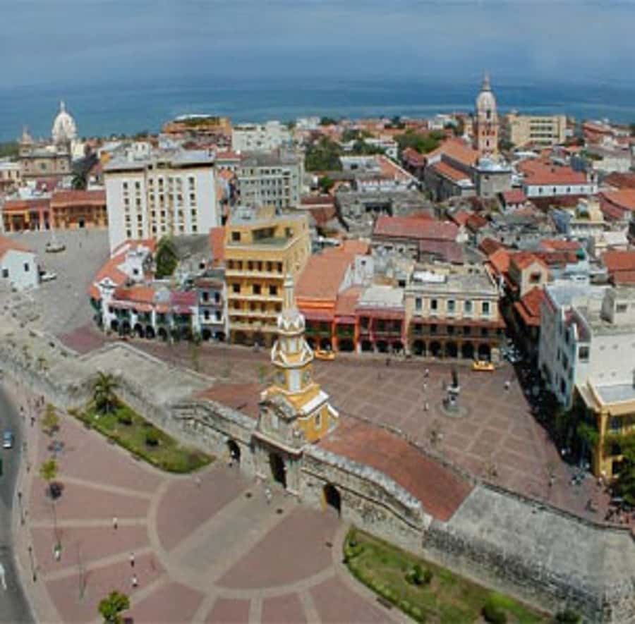 Cartagena City Tour with San Felipe Castle & Old Town Walk - Entering the Walled City: Clock Tower to Plaza de la Aduana