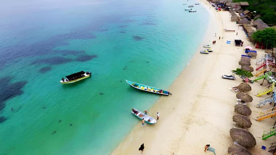 Cartagena: Visit 4 islands in a speedboat + plankton! - Playa Blanca on Barú: sunset payoff and a guided finish