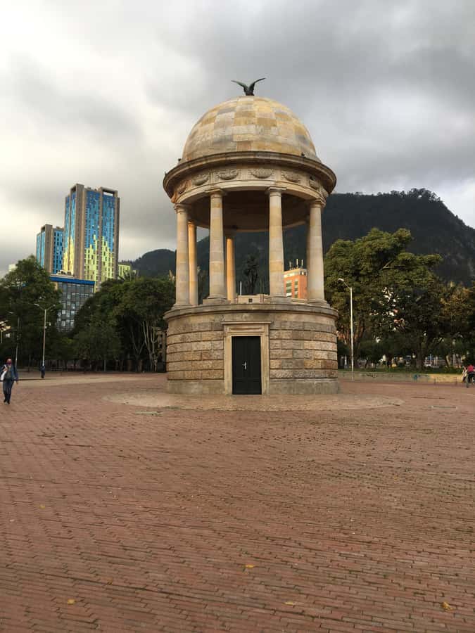 Complete Walking Tour in Bogota's Downtown - Chorro de Quevedo Plaza: photos, free time, street snacks, and dance
