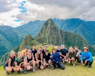 Cusco: 4-Day Lares Trek to Machu Picchu with Panoramic Train - Day 1: Calca market, ancient ruins, Lares hot springs, and alpaca valleys