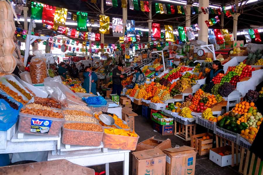 Cusco: Planetarium and Night Tour with Dinner and Pisco Sour - San Pedro Market: herbs, fruit, and why locals shop this way