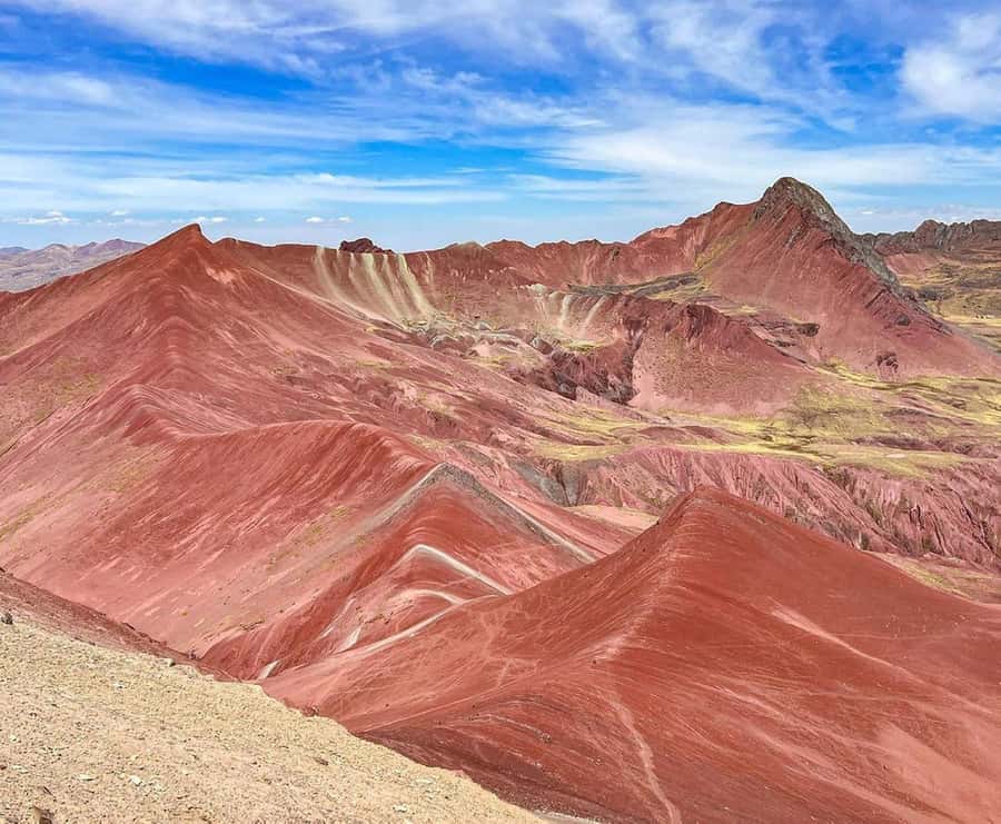 Cusco : Rainbow Mountain and Red Valley Tour - Hotel pickup, private round-trip transport, and the long drive south