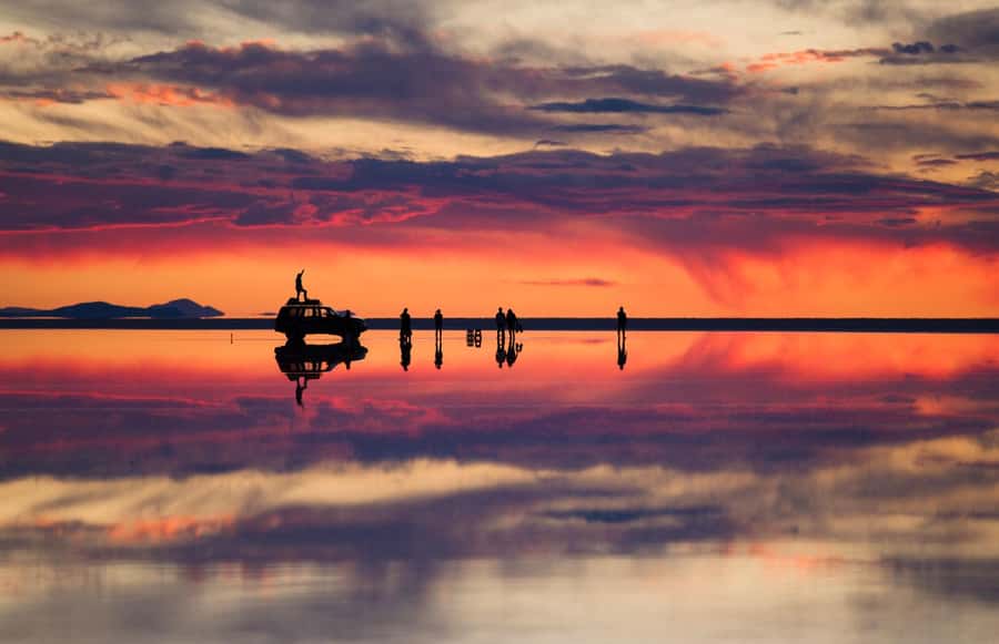 From La Paz: Trip to Uyuni Salt Flats with Wine at Sunset - Entering the Uyuni Salt Flats: Train Cemetery and the First Shock of White