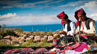 From Puno: Excursion to Uros and Taquile Islands + Income - Arriving on the Uros floating islands: what makes them different