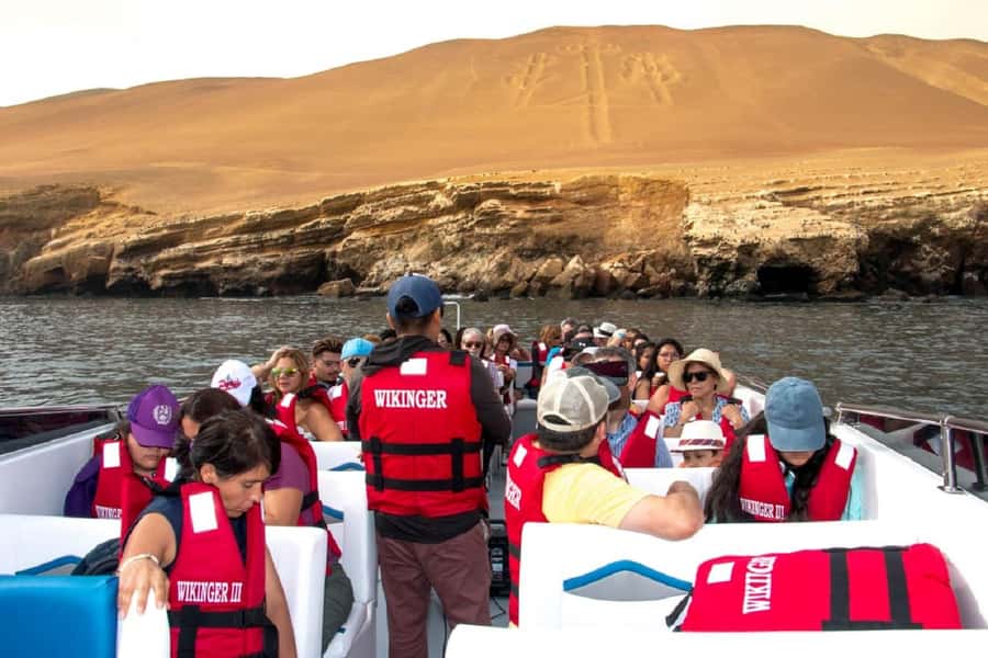 From San Martin Port: Ballestas Island & Paracas Reserve - Red Beach and Lagunillas: two very different shore moods